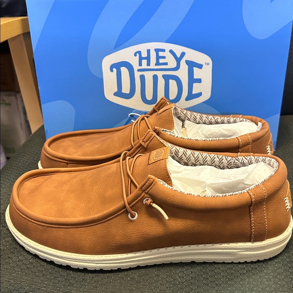 Hey Dudes men’s size 13 Wally Classics 
New with tags